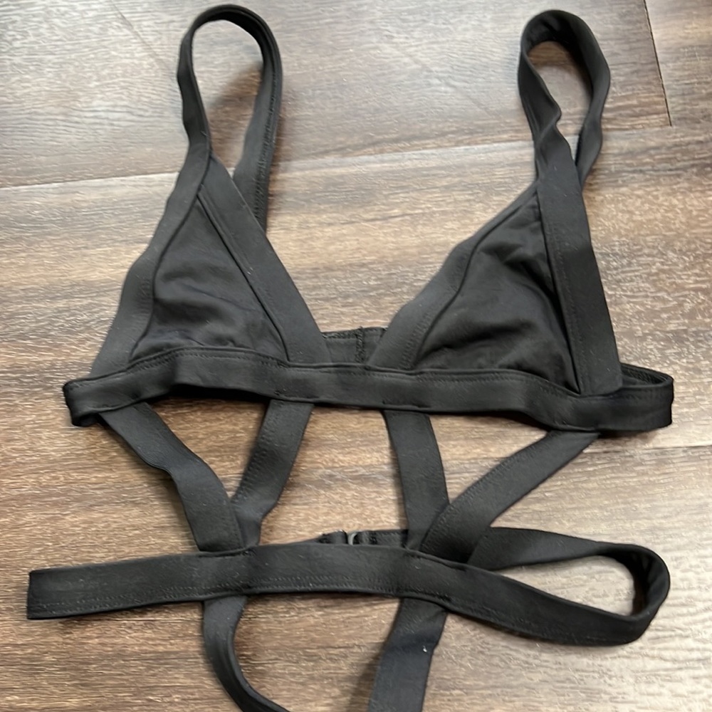 Really sexy black strappy clasp swimsuit. Clasps in back. Looks amazing on. Sz S - Picture 3 of 5